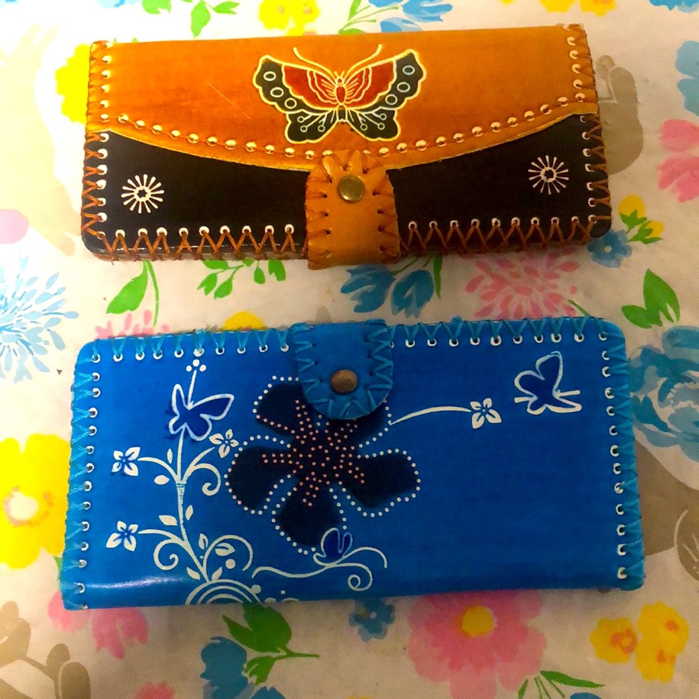 Two beautiful handcrafted billfolds.